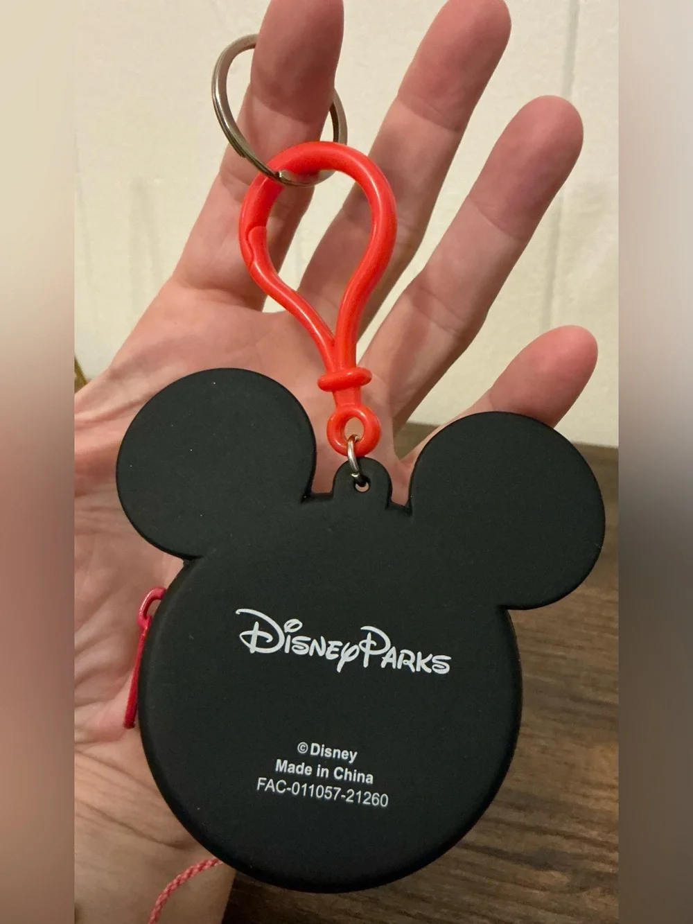 A rare Disney Parks Mickey Mouse silicon coin purse keychain